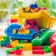 Colorful plastic children toys on the floor
