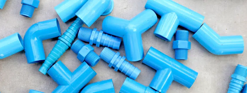 Blue pvc pipe connections for plumbing work.